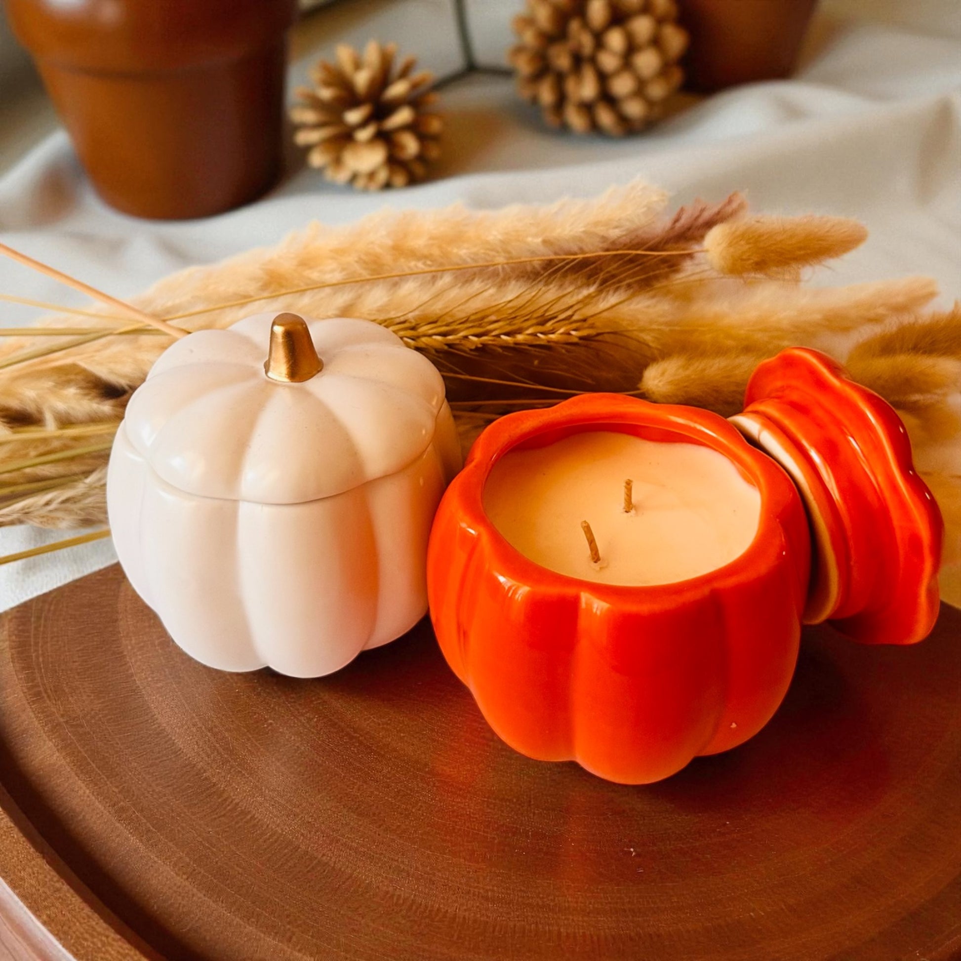 pumpkin candle white and orange